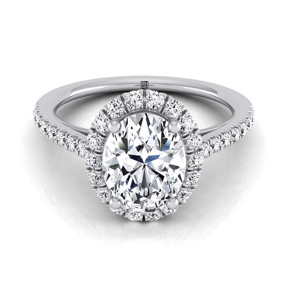 The Dylan oval setting in 18K White Gold, a petite french pavé halo design from RockHer