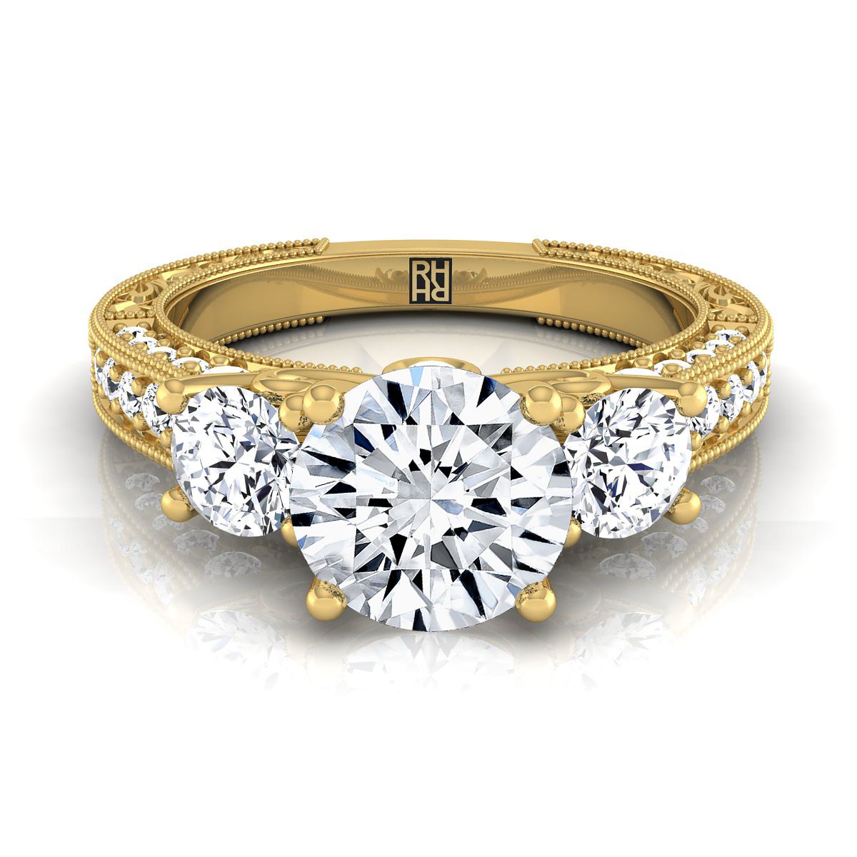 The Rosie round setting in 18K Yellow Gold, a select vintage three stone design from RockHer