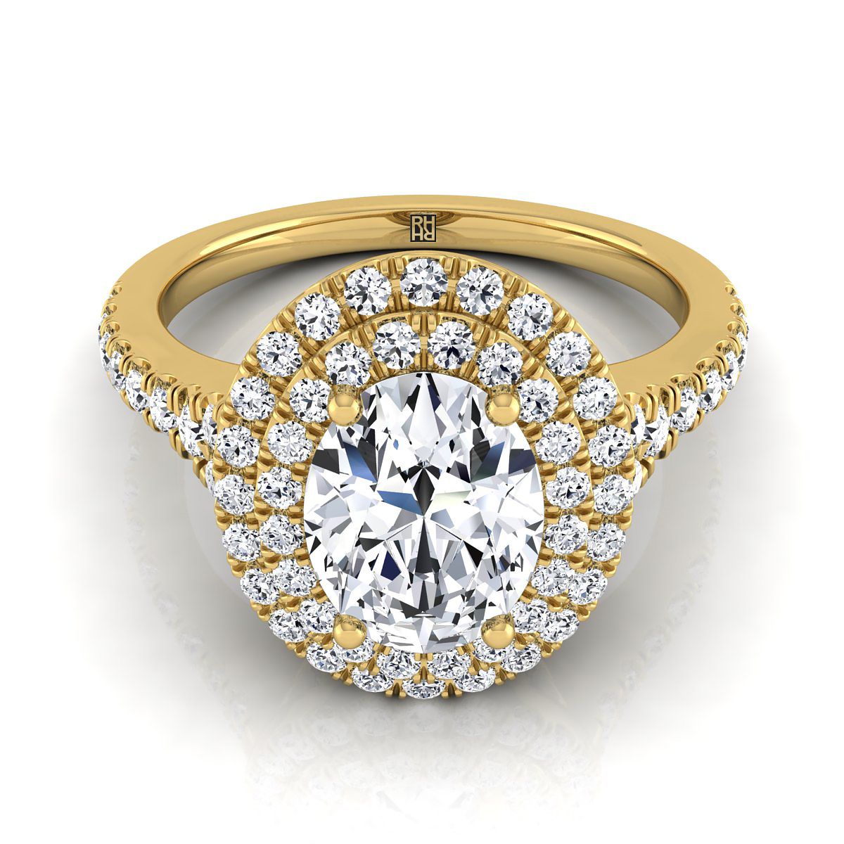 The Britney oval setting in 18K Yellow Gold, a double halo design from RockHer