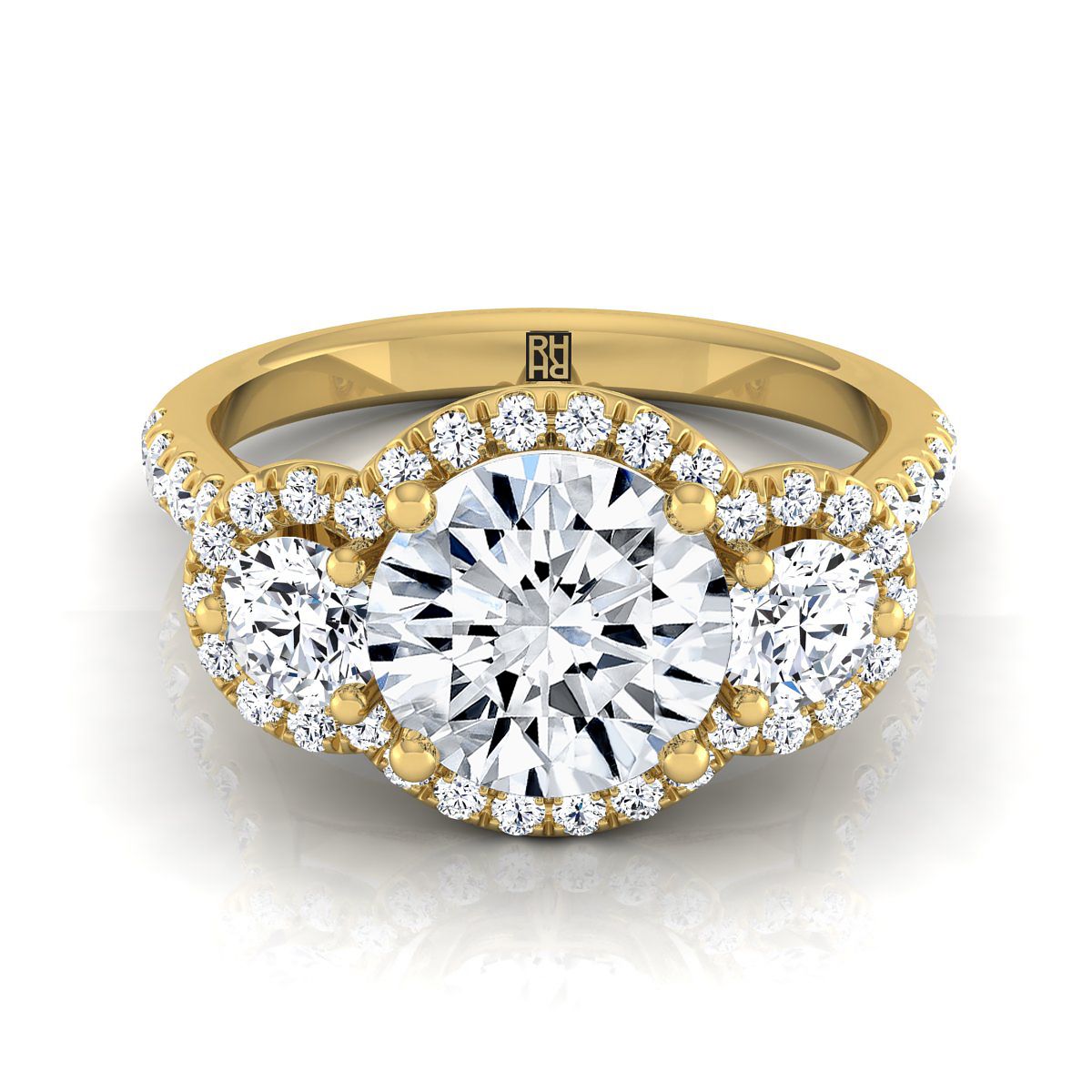 The Andrea round setting in 18K Yellow Gold, a select three stone halo design from RockHer