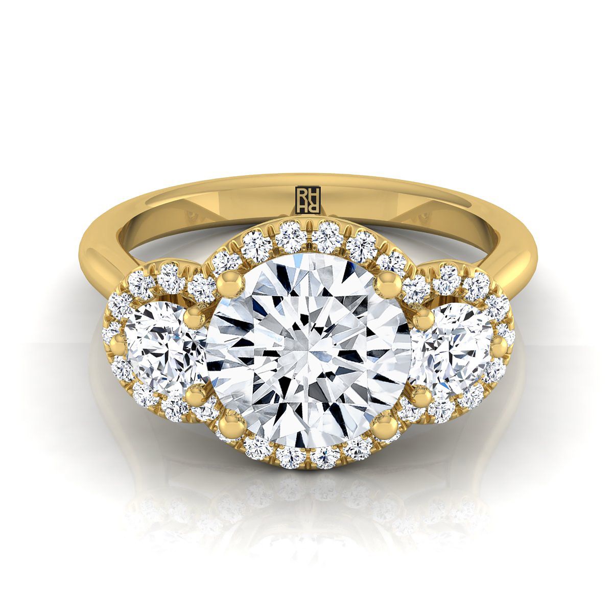 The Anna round setting in 18K Yellow Gold, a select three stone halo design from RockHer