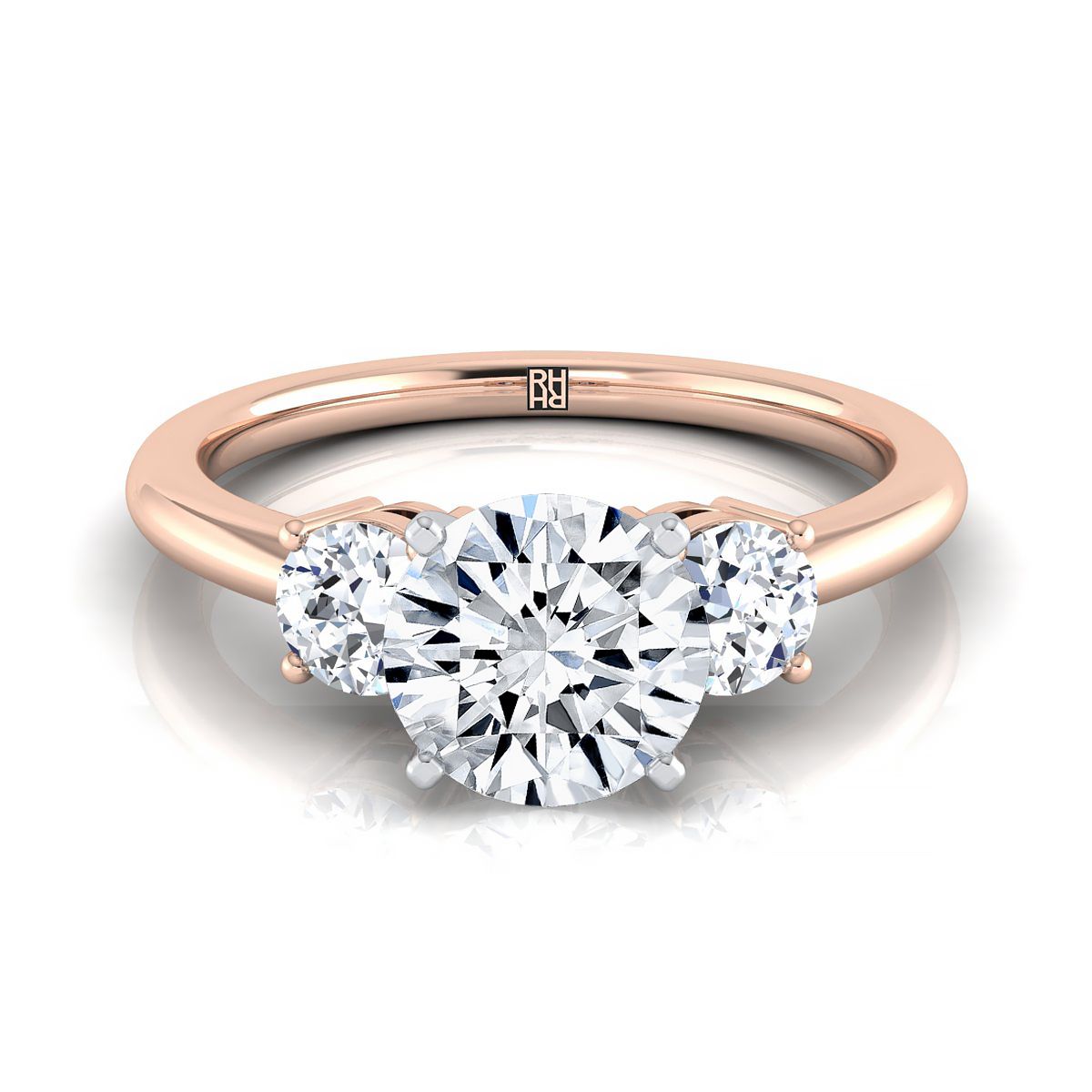 The Anita round setting in 14K Rose Gold, a select classic three stone design from RockHer
