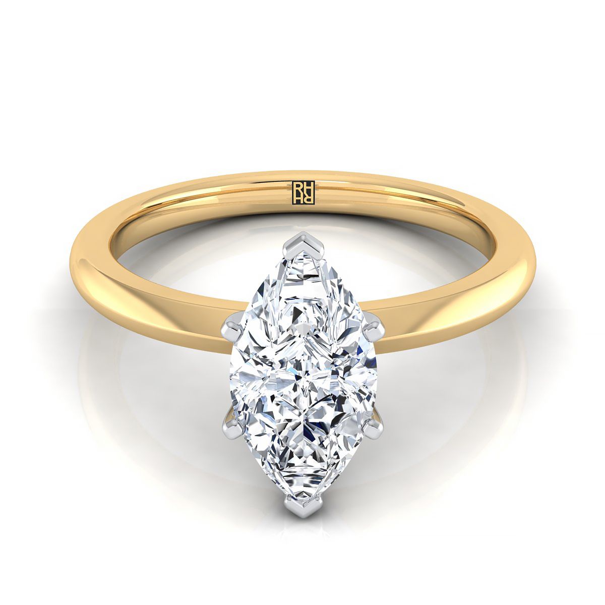 The Isolde petite knife edge solitaire engagement ring setting, shown in 18K Yellow Gold | RockHer