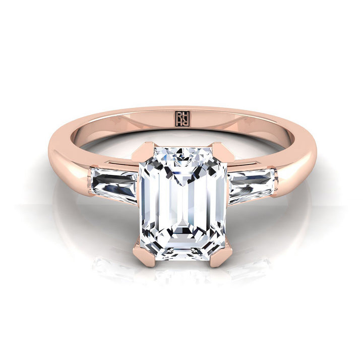 Caroline Select tapered baguette three stone emerald cut emerald cut ring in 14K Rose Gold — view — RockHer