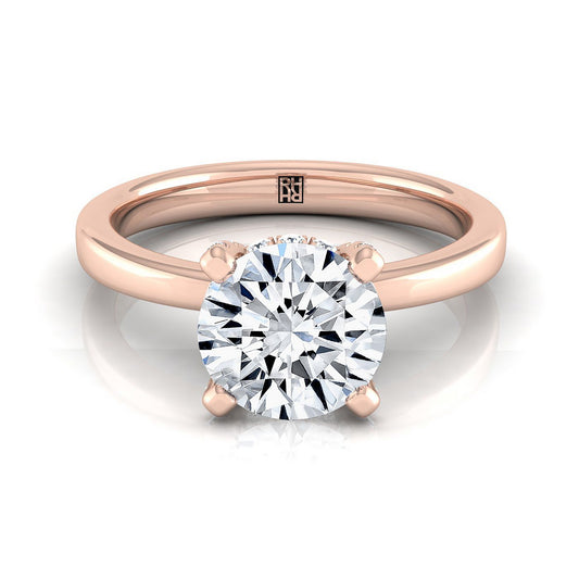 14K Rose Gold Round Brilliant Diamond Adorned Claws and Secret Halo Solitaire Engagement Ring -1/10ctw