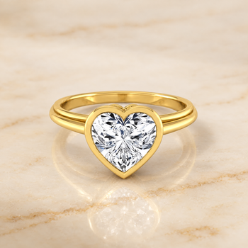 The Hayley Bezel Cathedral Solitaire Heart Engagement Ring Setting in 18K Yellow Gold
