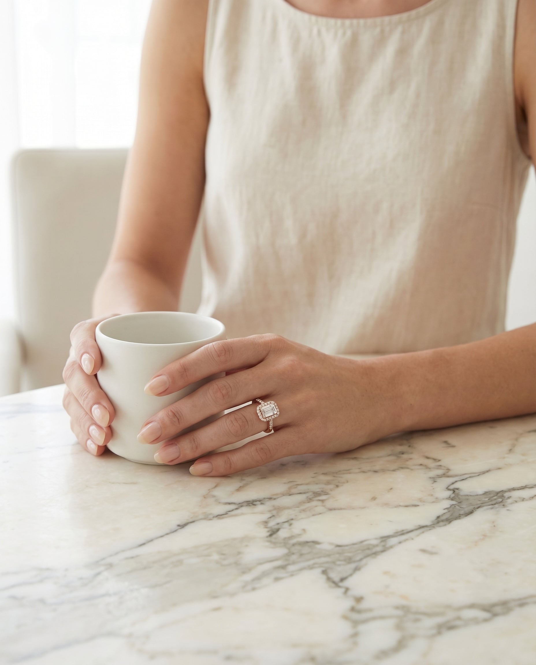 Crimson Select East West Horizontal Halo Emerald Cut Lab Diamond Engagement Ring in 14K Rose Gold, lifestyle | RockHer