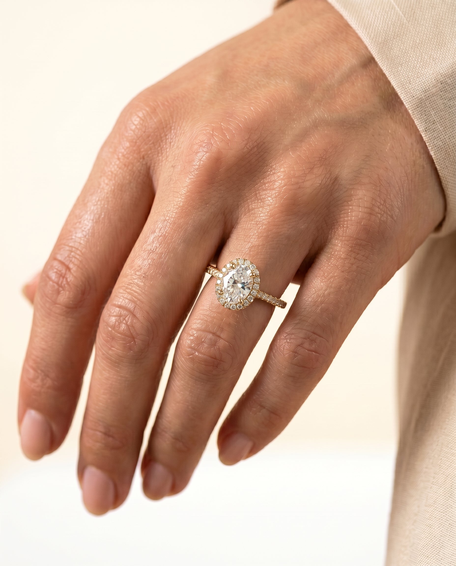 The Christina engagement ring setting in 18K Yellow Gold, select east west horizontal halo design | RockHer