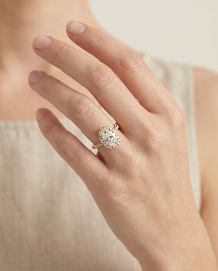 The Christina East West Pavé Halo Engagement Ring Setting for Oval Diamonds in 18K Yellow Gold