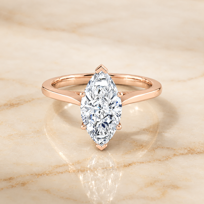 The Elena Timeless Graduated Beveled Shank Solitaire Marquise Engagement Ring Setting in 14K Rose Gold