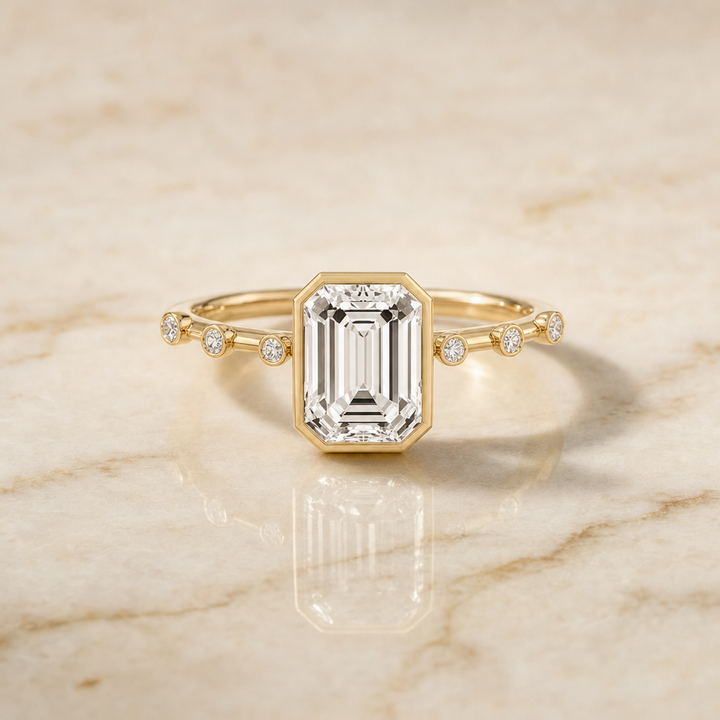 The Brandi Bezel Accent Solitaire Engagement Ring Setting for Emerald Diamonds in 18K Yellow Gold