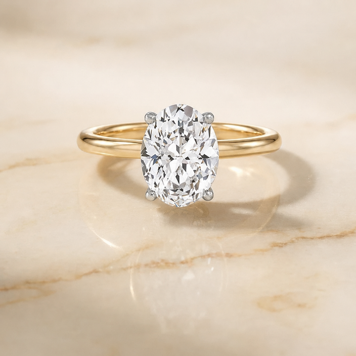 The Dolly Double Hidden Halo Solitaire Oval Engagement Ring Setting in 18K Yellow Gold