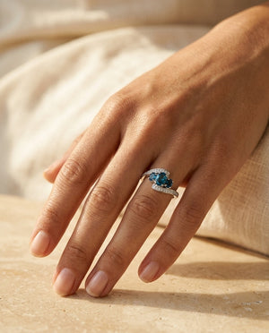 London Blue Topaz Three Stone Swirl Ring, in 14K White Gold – top view | RockHer