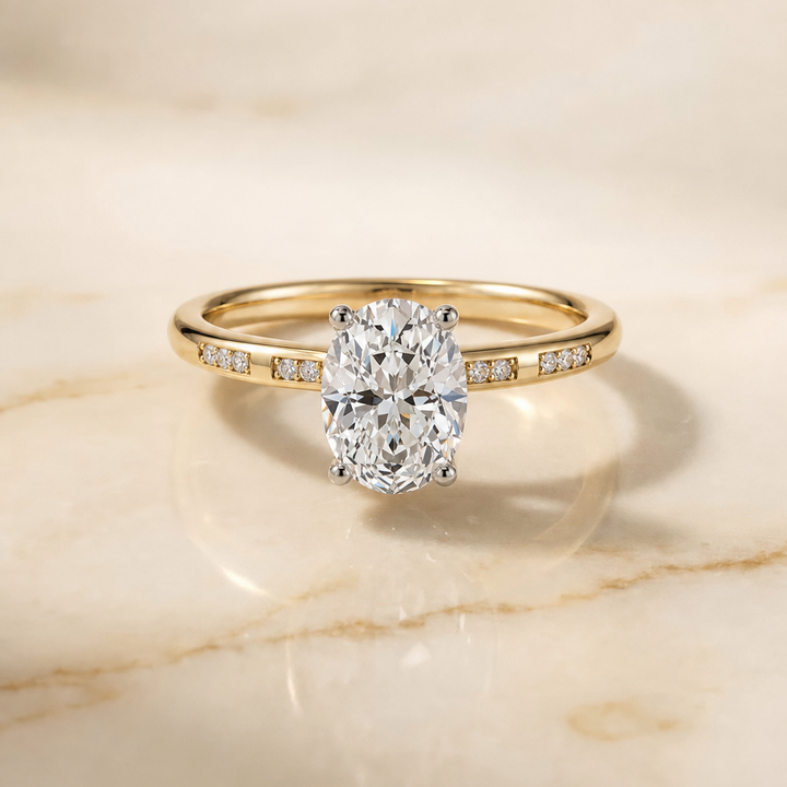 The Wanda Hidden Halo Pavé Solitaire Oval Engagement Ring Setting in 18K Yellow Gold