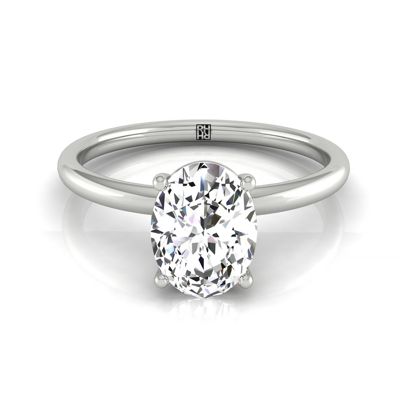 The Cyndi oval setting in 18K White Gold, a select curved hidden halo solitaire design from RockHer