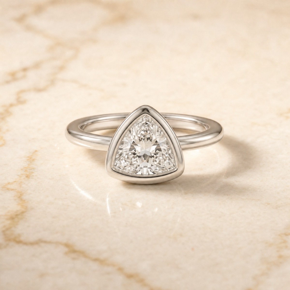 The Agnes Bezel Solitaire In Trillion Engagement Ring Setting in 18K White Gold
