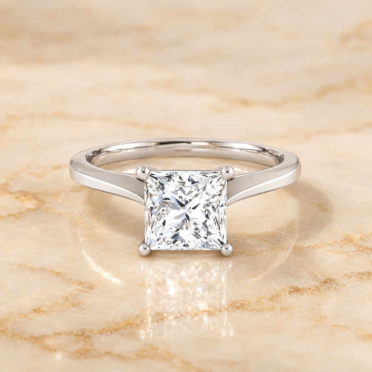 The Elena Timeless Graduated Beveled Shank Solitaire Princess Cut Engagement Ring Setting in Platinum