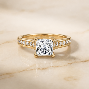 The Celesta Channel Set Pavé Princess Cut Engagement Ring Setting in 18K Yellow Gold