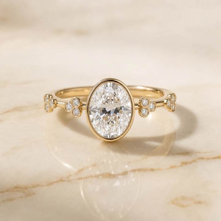 The Miley Clover Bezel Accent Solitaire Oval Engagement Ring Setting in 18K Yellow Gold