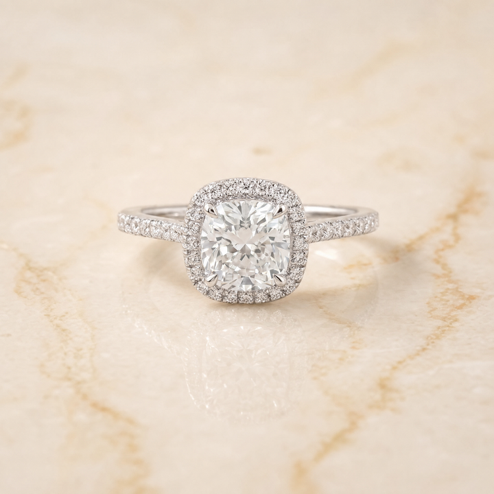 The Sonata Graduated Shank Pavé Halo Cushion Cut Engagement Ring Setting in Platinum