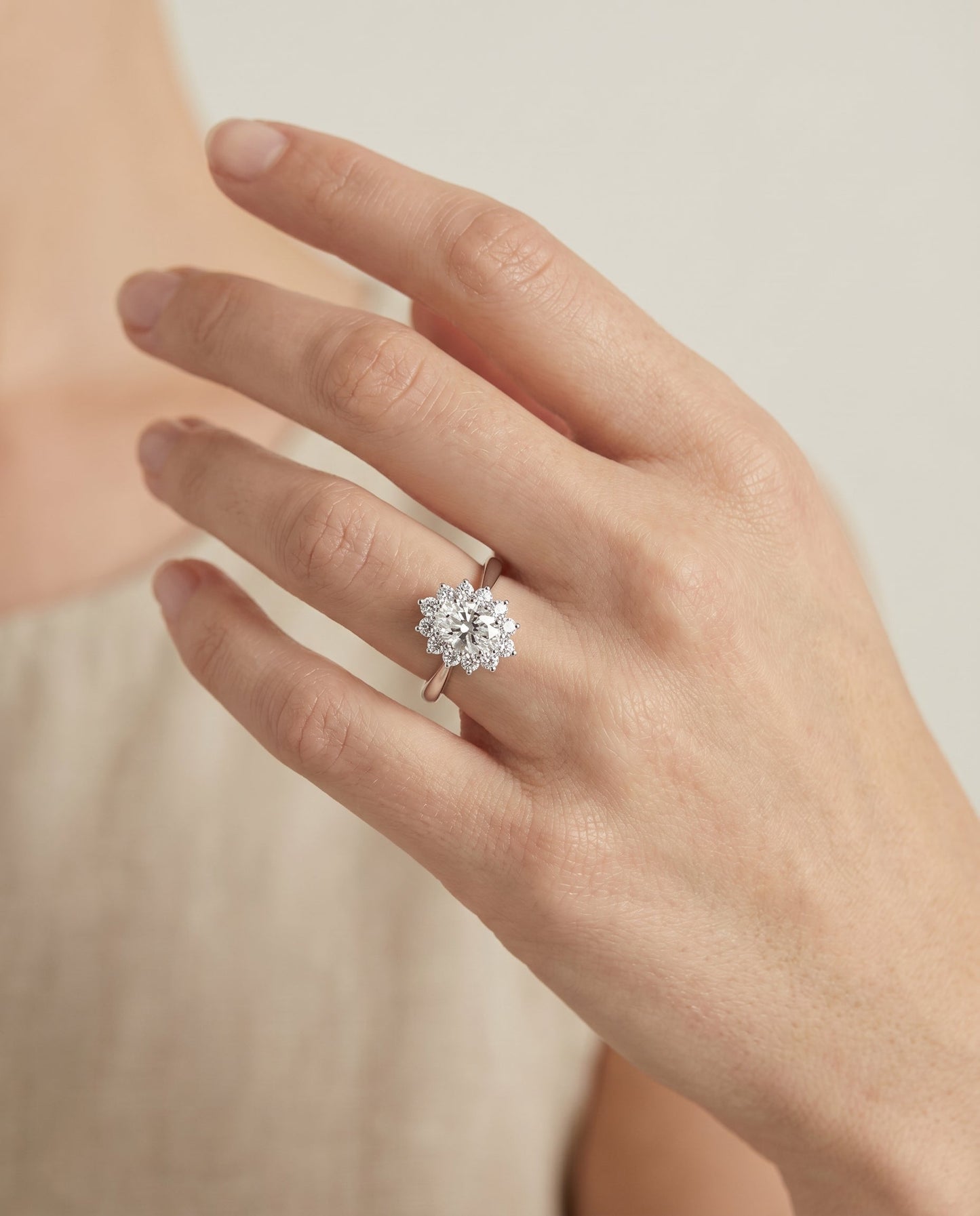 Eloise floral halo engagement ring in platinum with oval lab diamond — RockHer