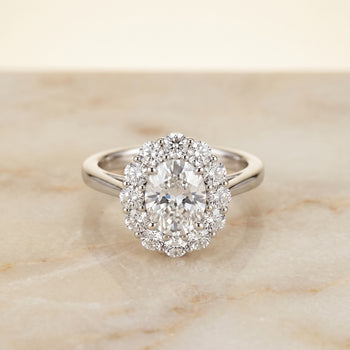 The Faith Floral Prong Halo Oval Engagement Ring Setting in 18K White Gold