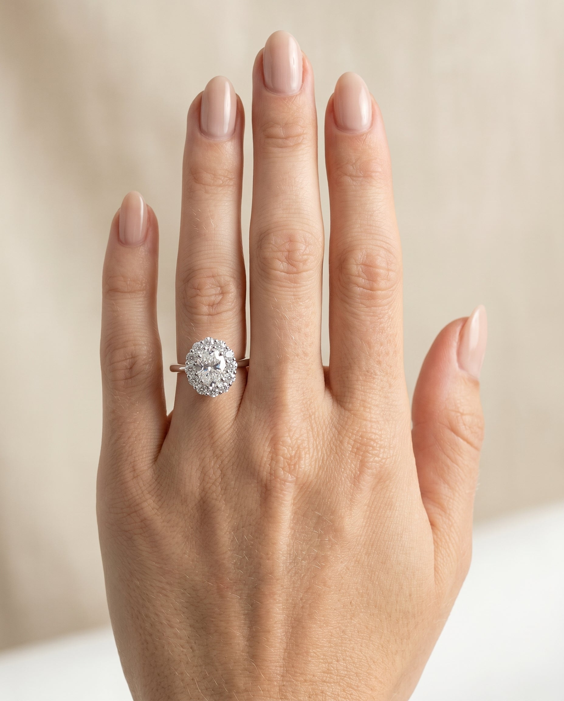 The Faith engagement ring setting in Platinum, floral prong halo design | RockHer