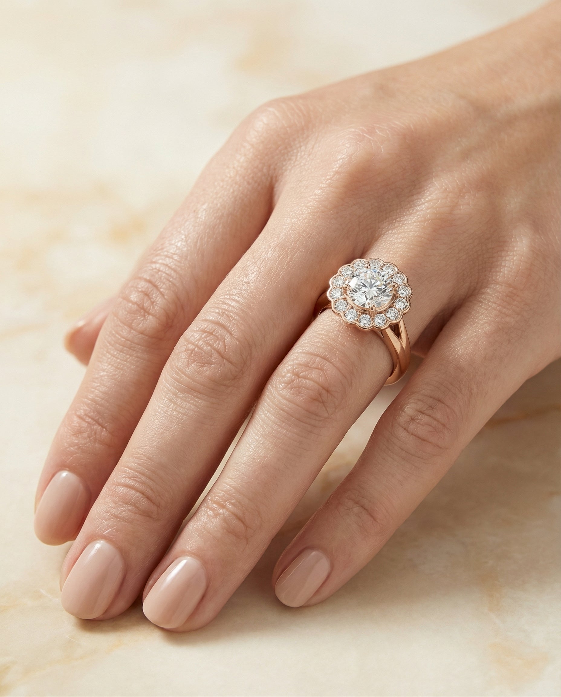 The Nera engagement ring setting in 14K Rose Gold, floral split shank halo design | RockHer