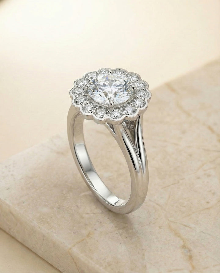 Round Brilliant, Floral Split Shank Halo, in 18K White Gold, prong setting – angled view | RockHer