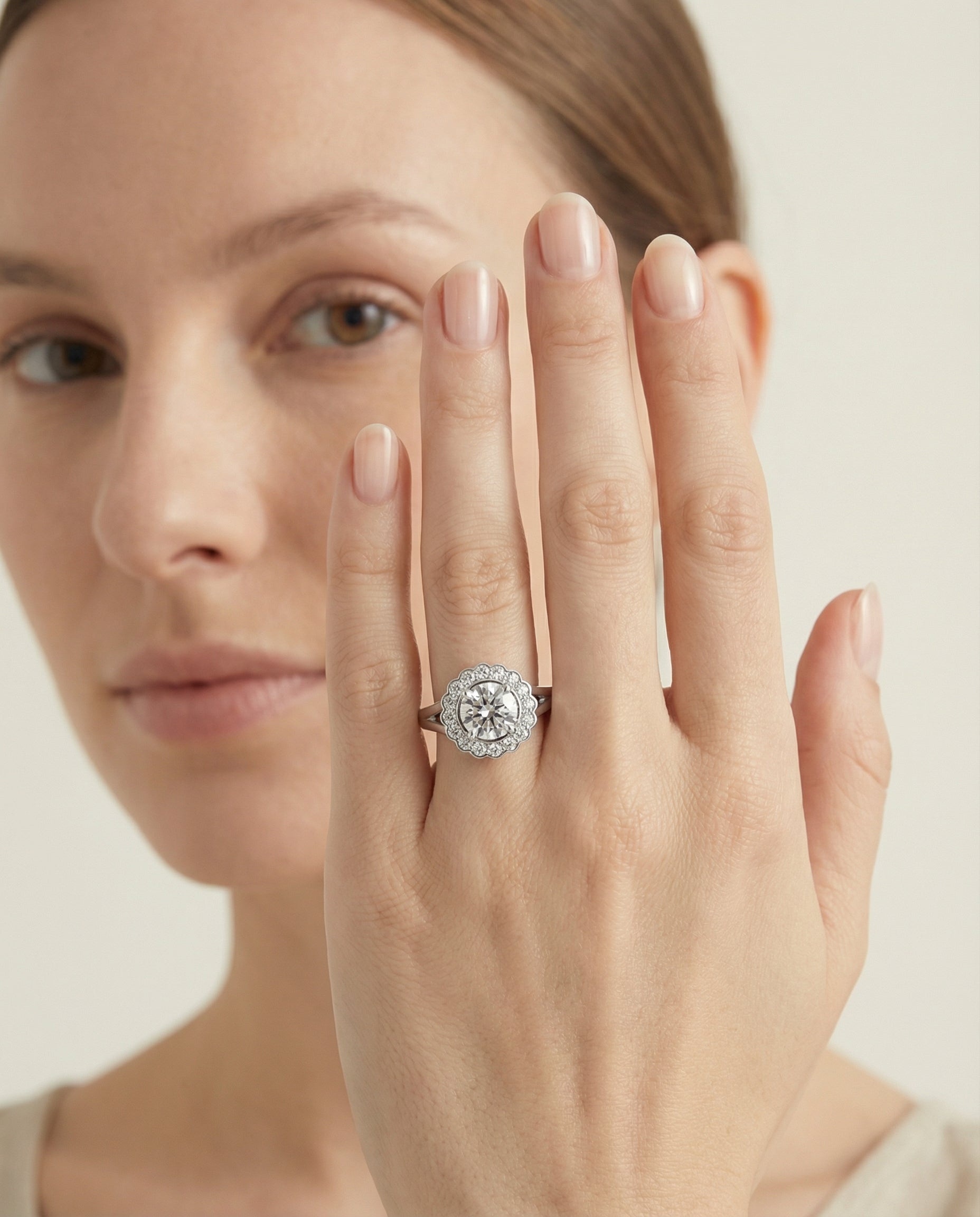 The Nera engagement ring setting in 18K White Gold, select floral split shank halo design | RockHer