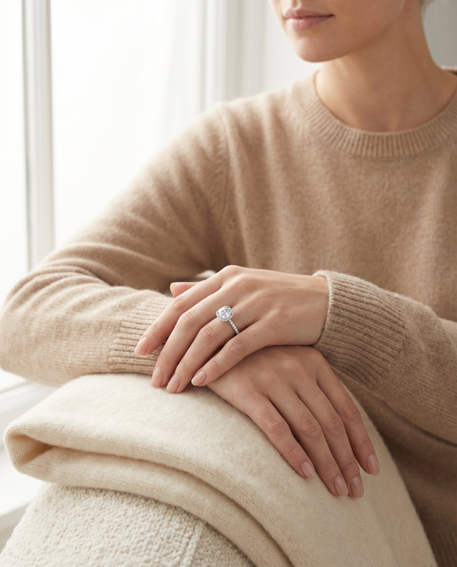 The Hymn cushion setting in Platinum, a french pavé halo frame cut design from RockHer
