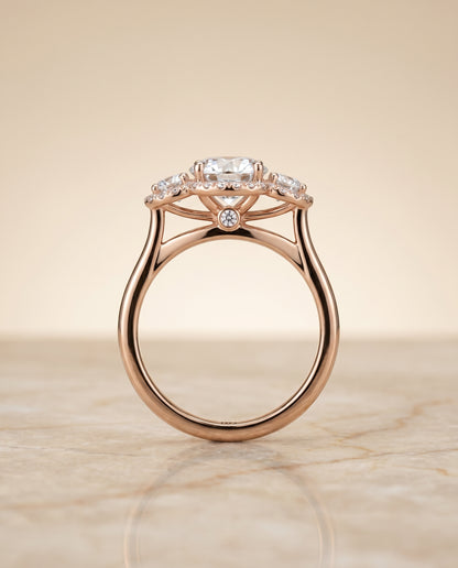 Round Brilliant, French Pavé Three Stone, in 14K Rose Gold, prong setting – side profile | RockHer