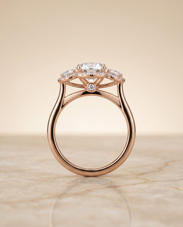 Round Brilliant, French Pavé Three Stone, in 14K Rose Gold, prong setting – side profile | RockHer