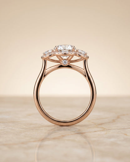 Anna Select Three Stone Halo Round Lab Diamond Engagement Ring in 14K Rose Gold, side view | RockHer