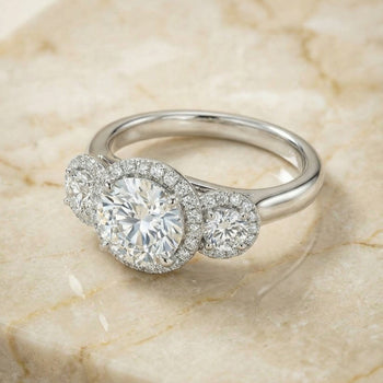 The Anna Three Stone Halo Round Engagement Ring Setting in Platinum
