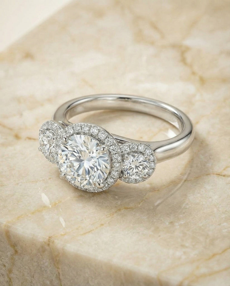 The Anna Select Three Stone Halo Round Lab Diamond Engagement Ring in Platinum