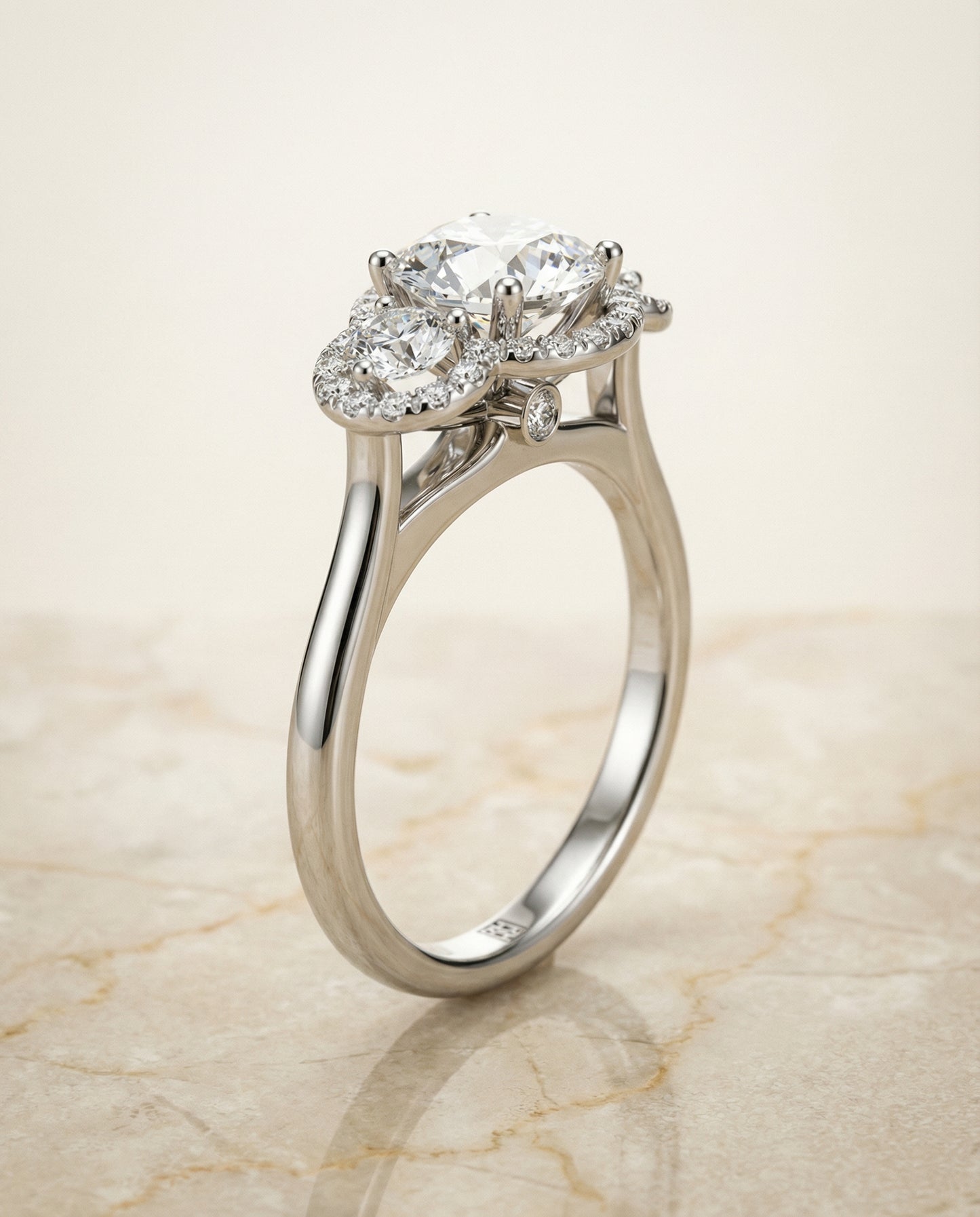 Round Brilliant, French Pavé Three Stone, in Platinum, prong setting – front view | RockHer