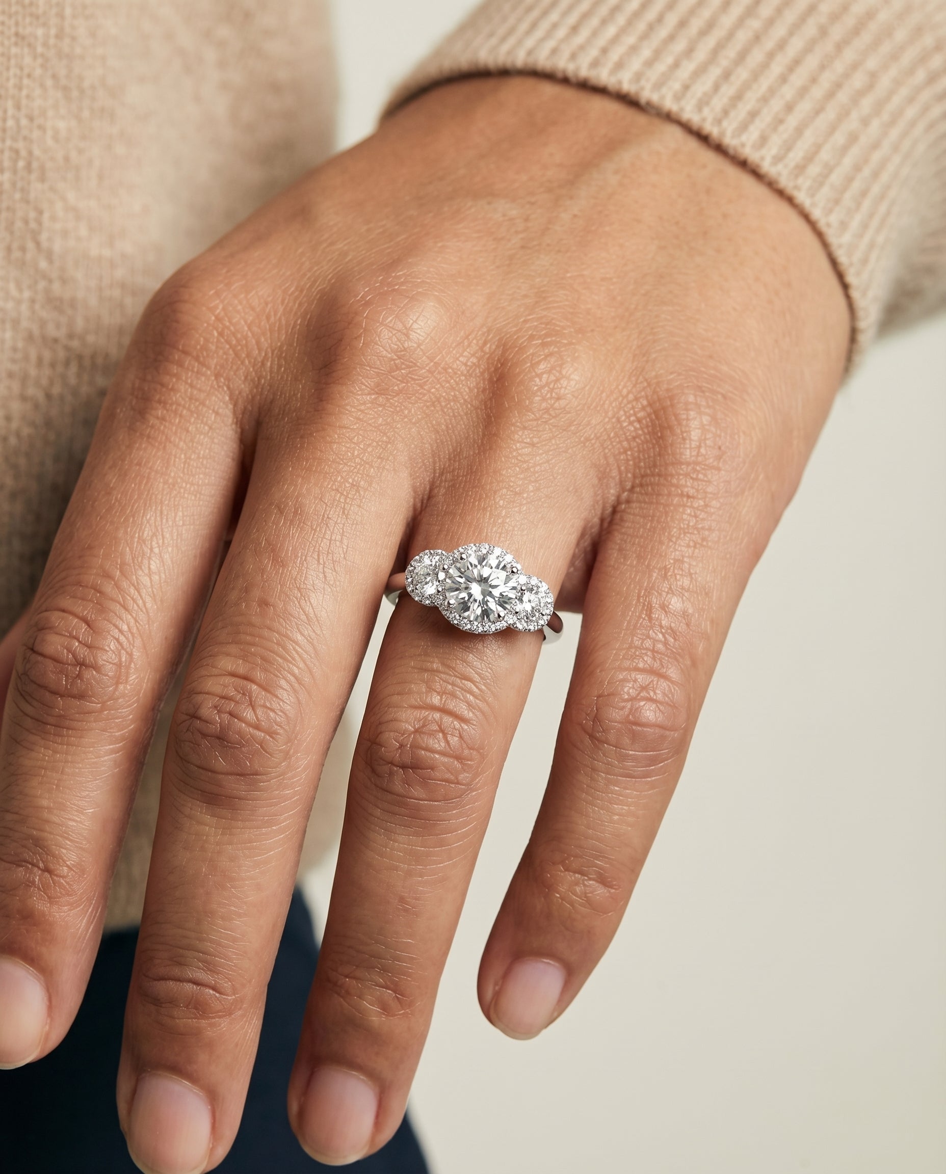 The Anna engagement ring setting in Platinum, three stone halo design | RockHer