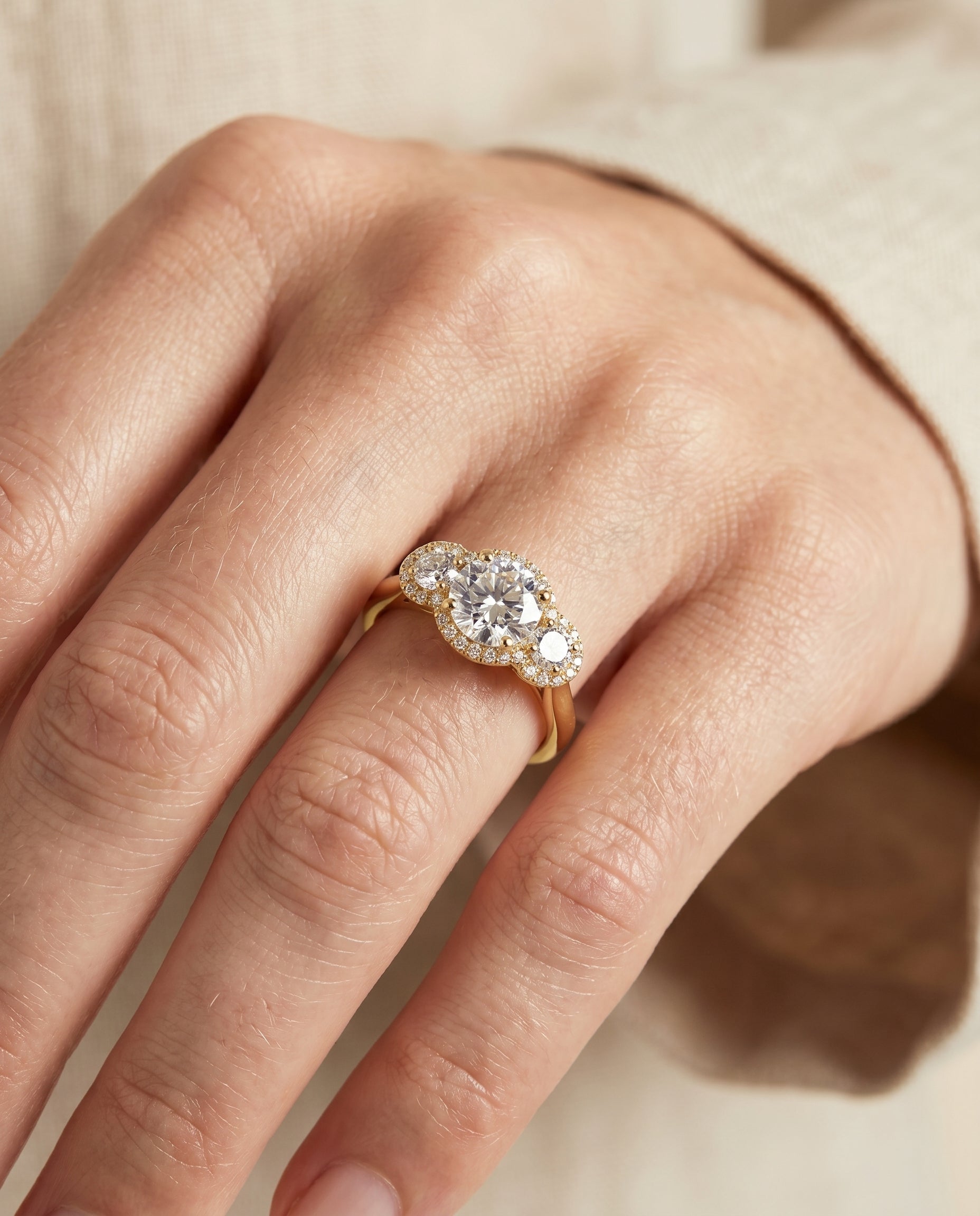 The Anna engagement ring setting in 18K Yellow Gold, three stone halo design | RockHer
