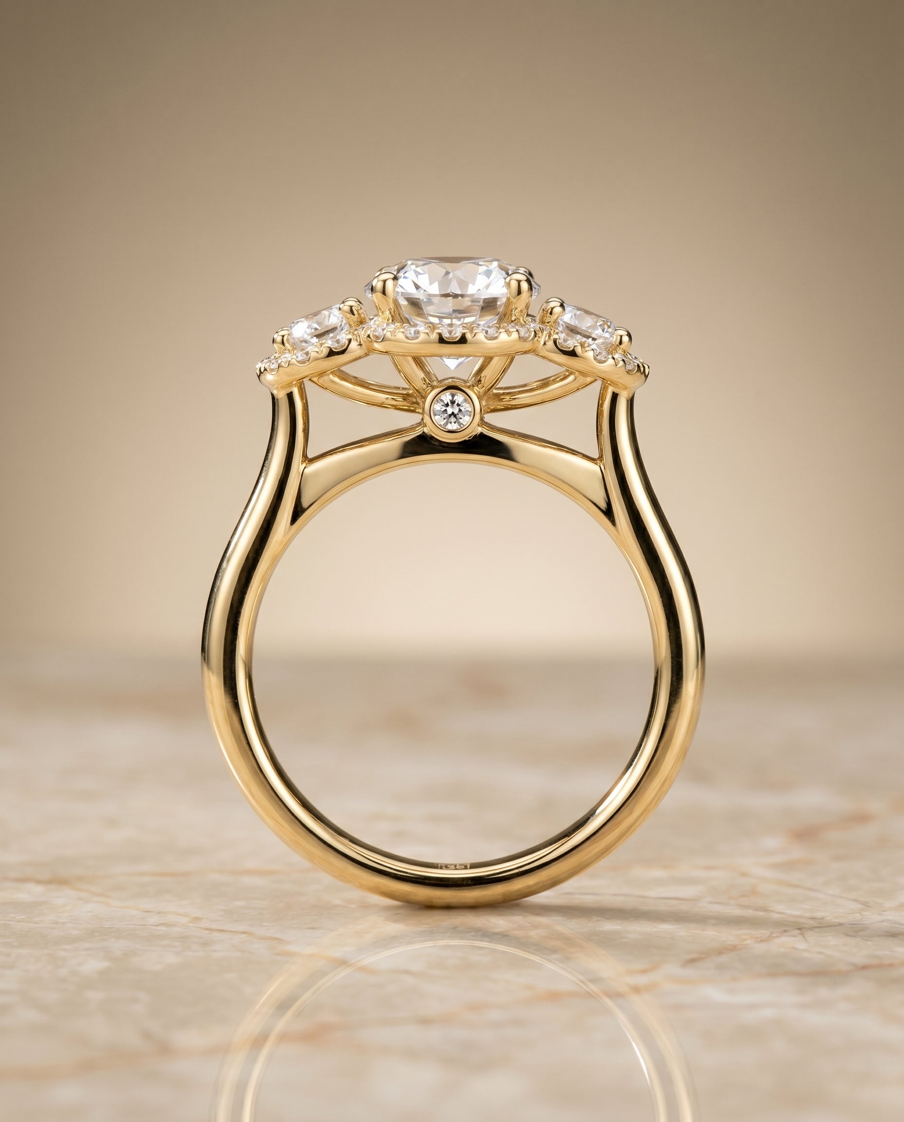 The Anna three stone halo engagement ring setting, shown in 18K Yellow Gold | RockHer