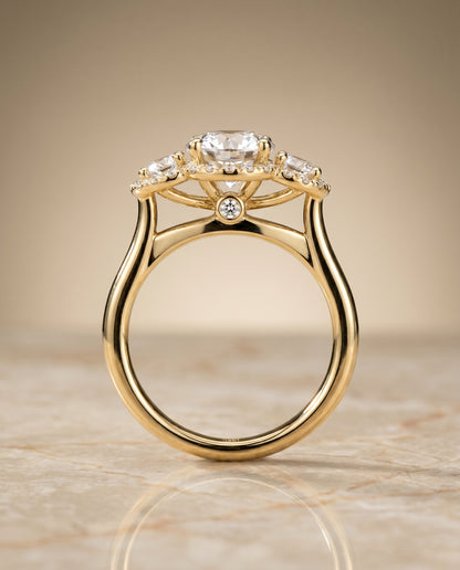 Round Brilliant, French Pavé Three Stone, in 18K Yellow Gold, prong setting – side profile | RockHer