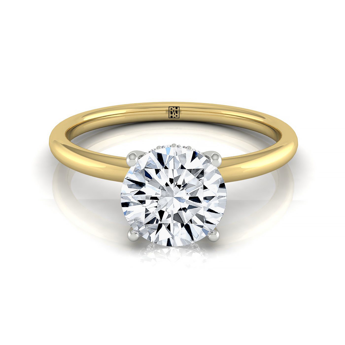 The Dolly round setting in 18K Yellow Gold, a select double hidden halo solitaire design from RockHer