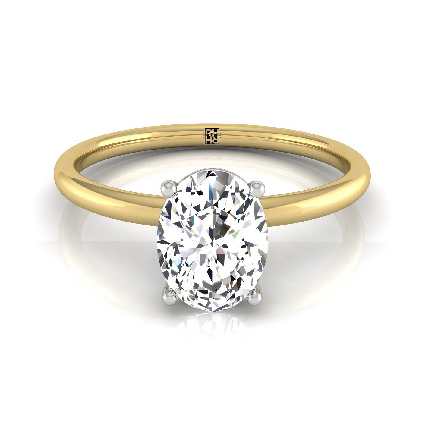 The Joni oval setting in 18K Yellow Gold, a select hidden halo solitaire design from RockHer