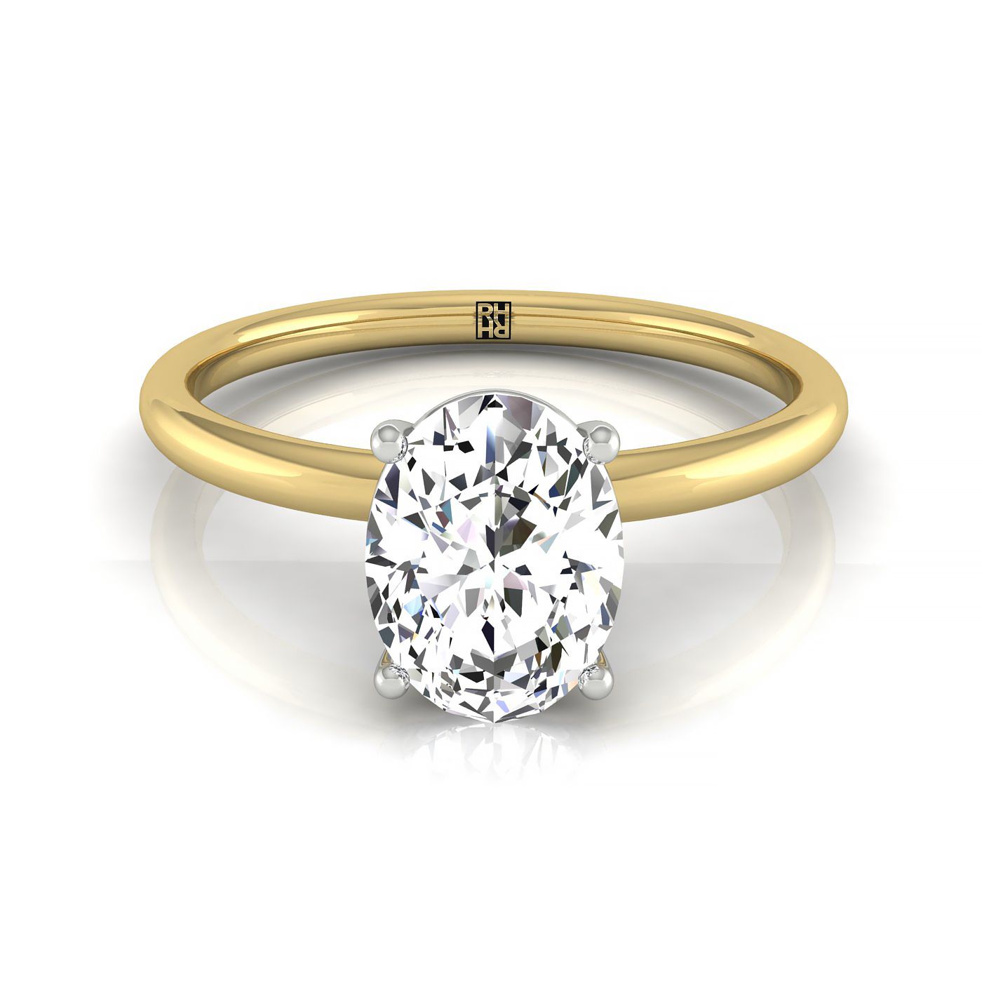 The Cyndi oval setting in 18K Yellow Gold, a select curved hidden halo solitaire design from RockHer