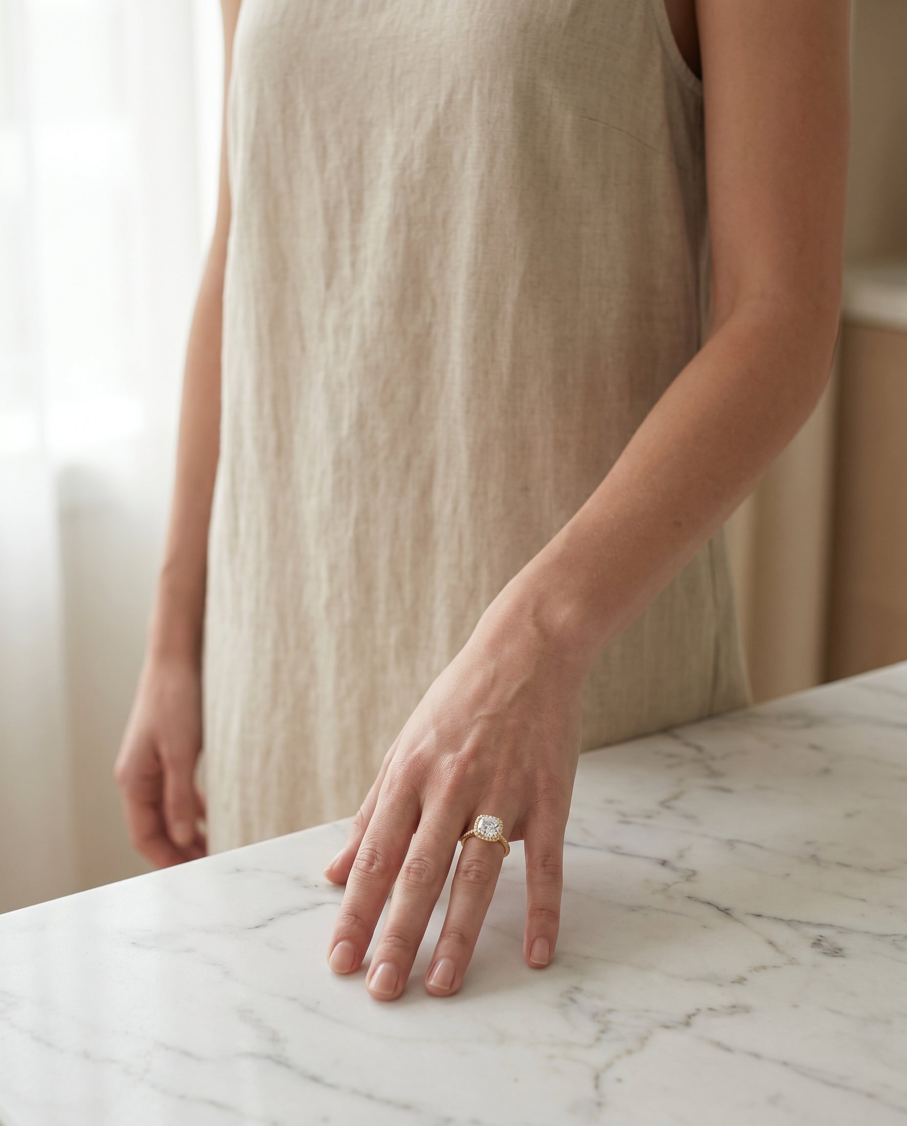 Sonata Select Graduated Shank Pavé Halo Cushion Cut Lab Diamond Engagement Ring in 18K Yellow Gold, lifestyle | RockHer