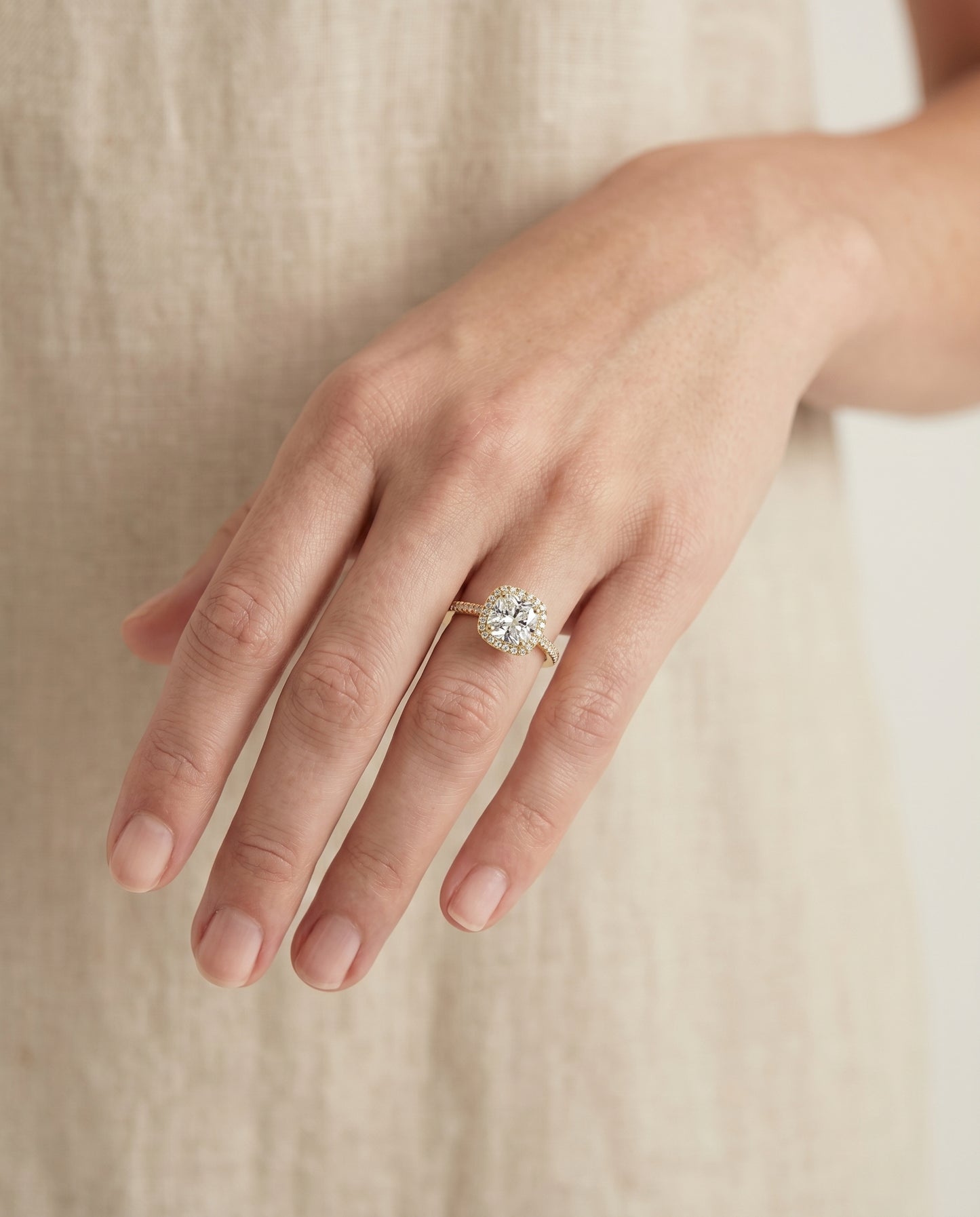 The Sonata Pavé Halo Engagement Ring Setting for Cushion Diamonds in 18K Yellow Gold