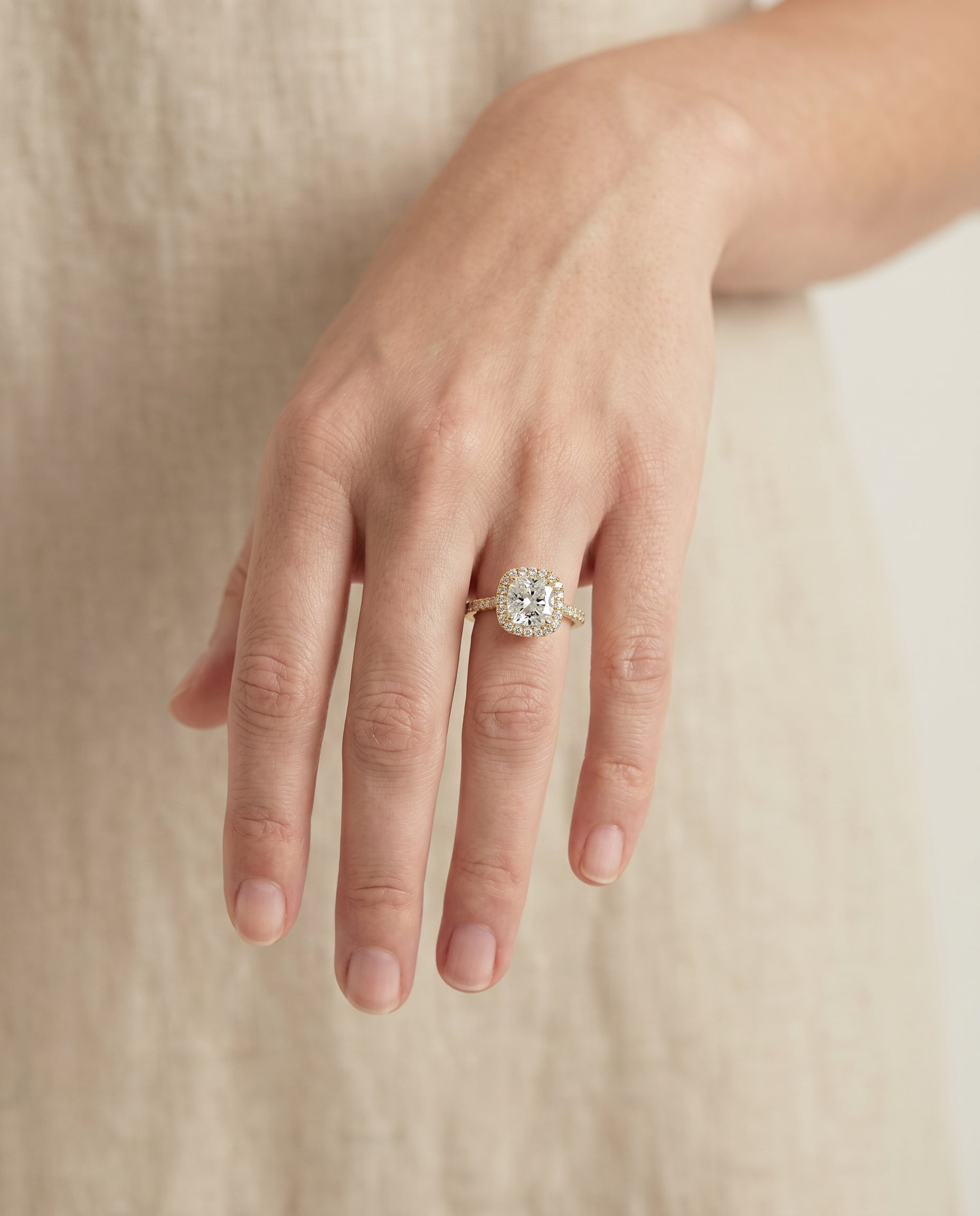 The Sonata engagement ring setting in 18K Yellow Gold, graduated shank pavé halo cut design | RockHer