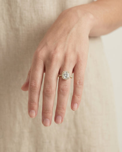 Sonata Select Graduated Shank Pavé Halo Cushion Cut Lab Diamond Engagement Ring in 18K Yellow Gold, shown on hand | RockHer