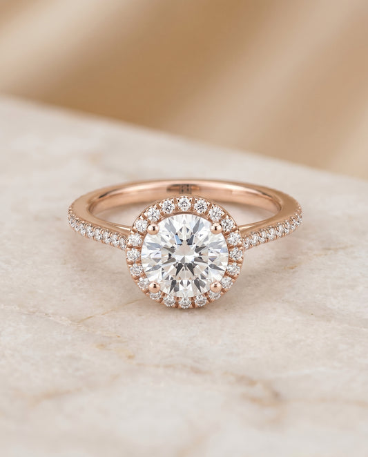 Round Brilliant, Graduated Shank Pavé Halo, in 14K Rose Gold, pave setting – angled view | RockHer