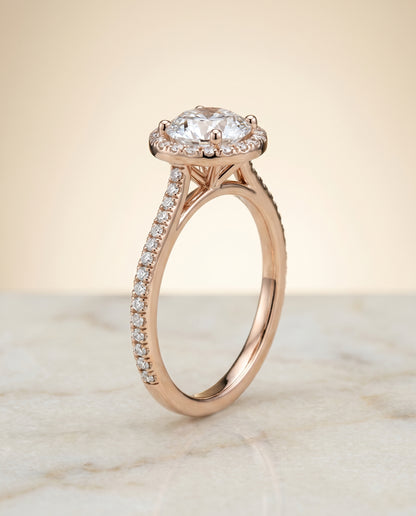 Round Brilliant, Graduated Shank Pavé Halo, in 14K Rose Gold, pave setting – front view | RockHer